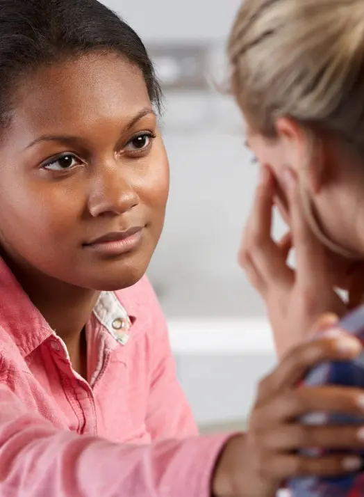 Teenage Girl Visits Doctor's Office Suffering With Depression